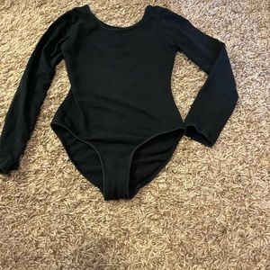 Long sleeve black dance leotard. Danskin good condition size 7/8.